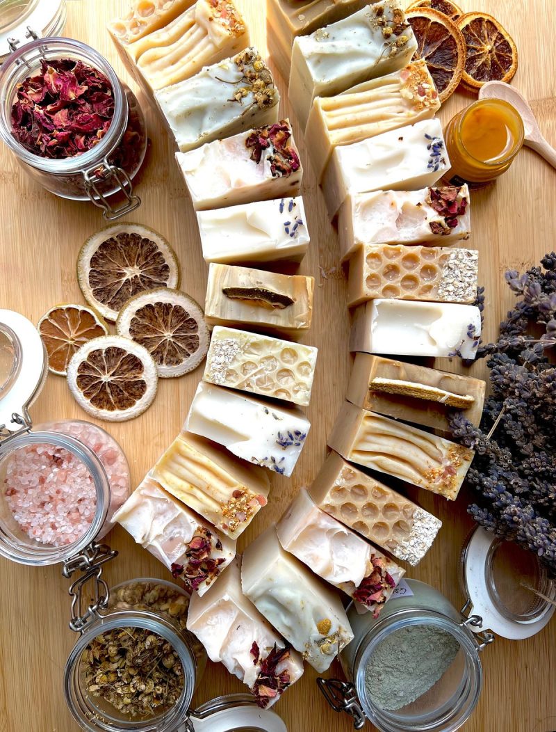 A set of handmade natural soap bars, shea butter, and coconut butter soap.
