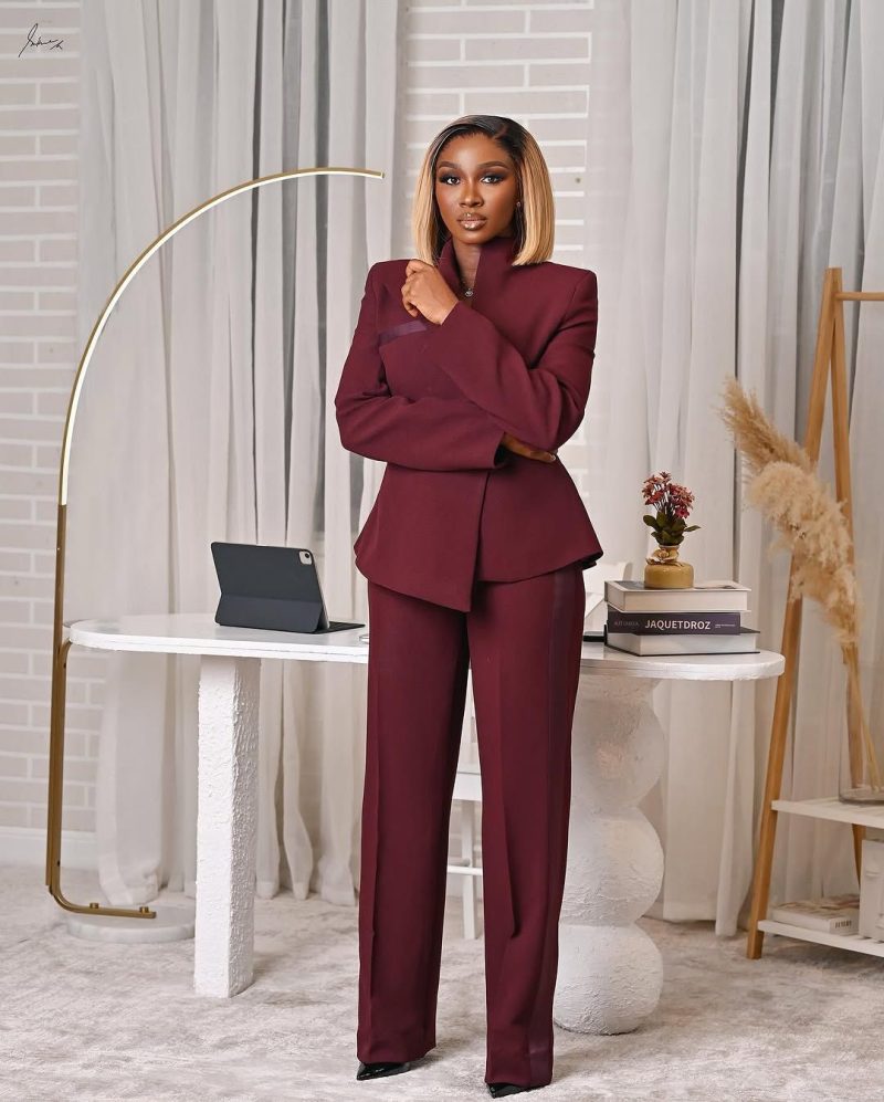 African woman in a well-tailored blazer.