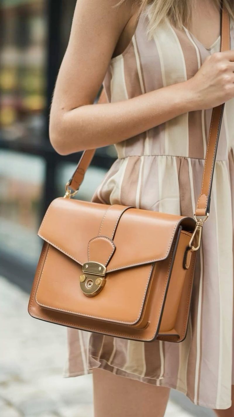 A woman with a chic crossbody bag.
