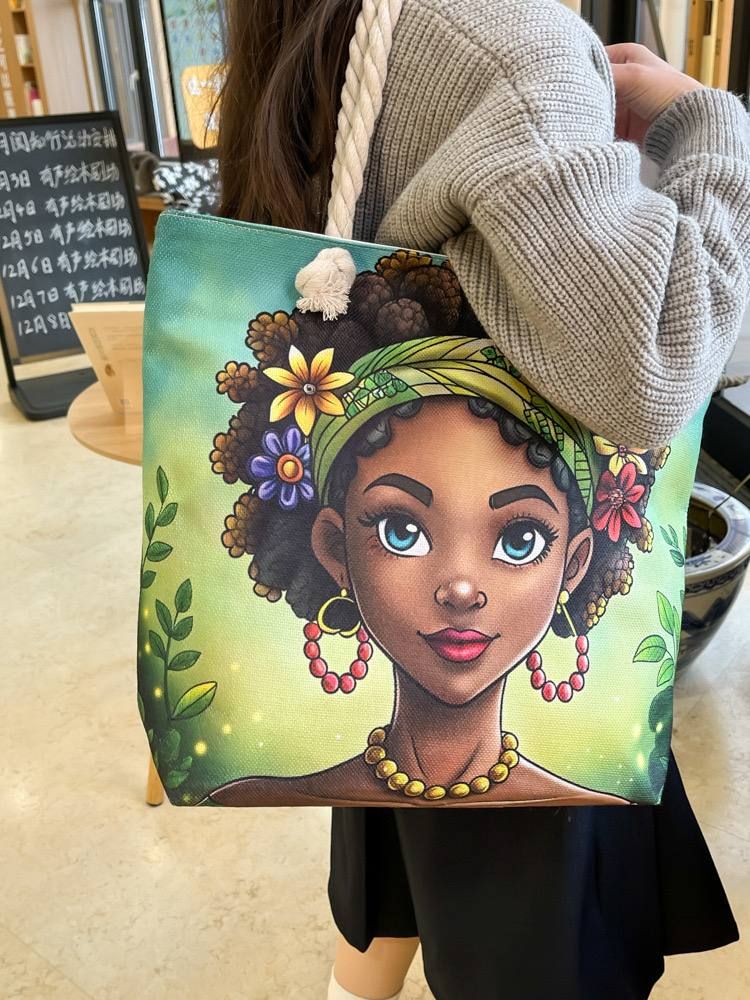 A natural canvas tote bag styled in a casual daytime look.
