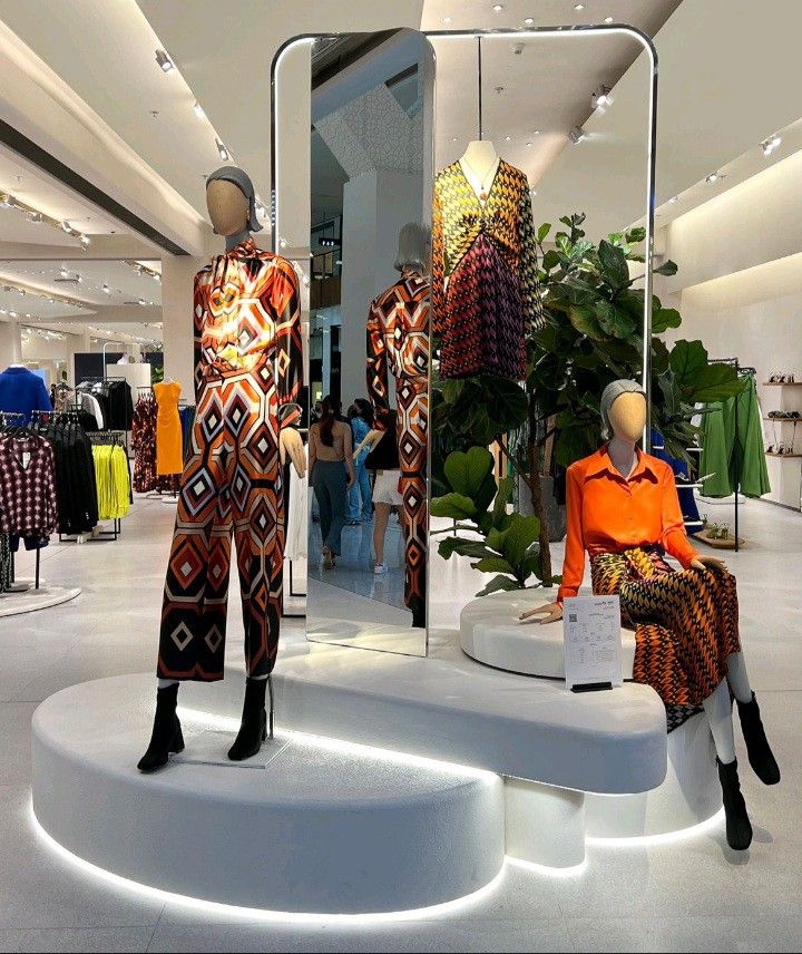 African minimalist garment displayed in a global luxury retail window, symbolising the commercial success and integration of structural African design.
