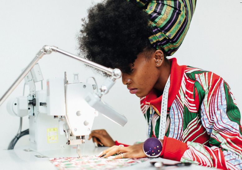 African female designer working on textile patterns for modern sportswear