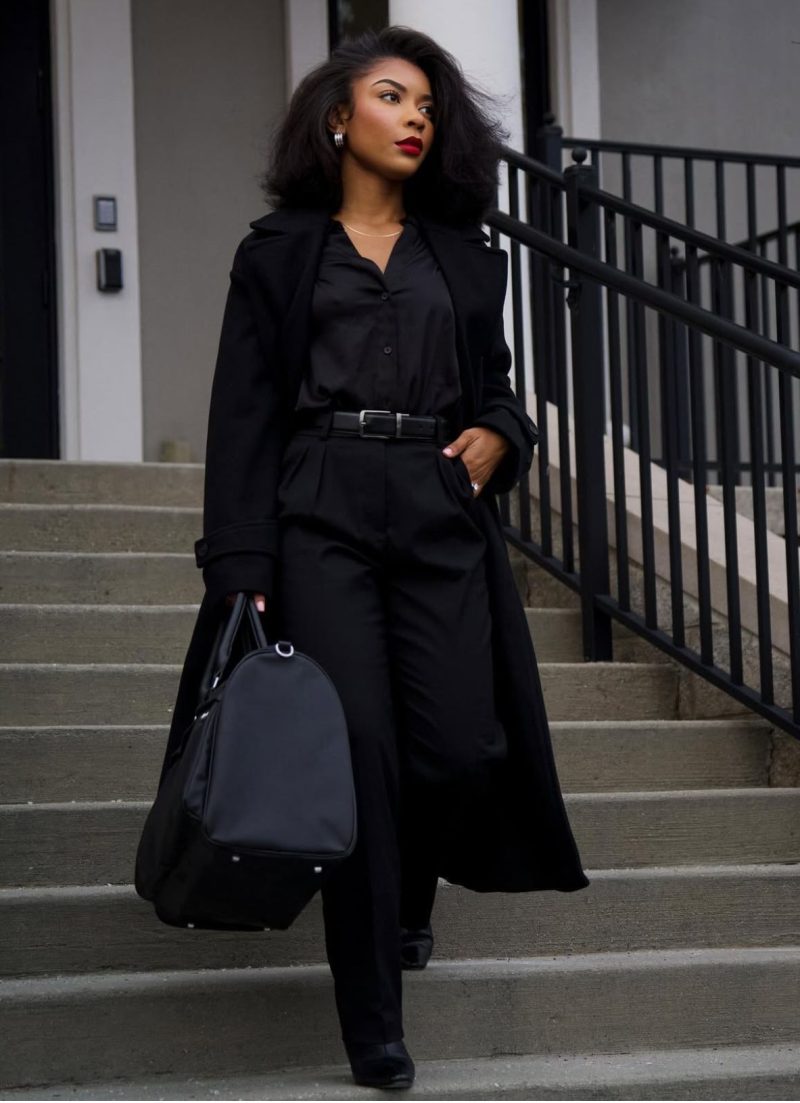 Professional African woman with polished natural hair styled for the workplace.