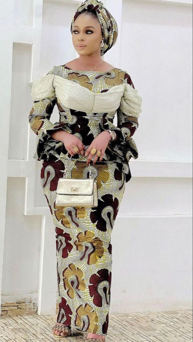 The Tailored Ankara Peplum Gown (Elegance With Precision)