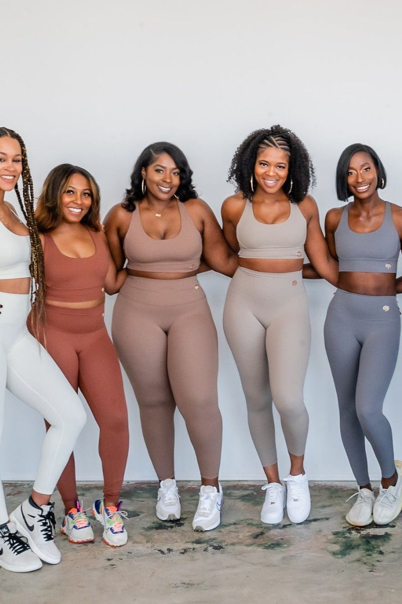 Diverse women in inclusive, sustainable sportswear sets.