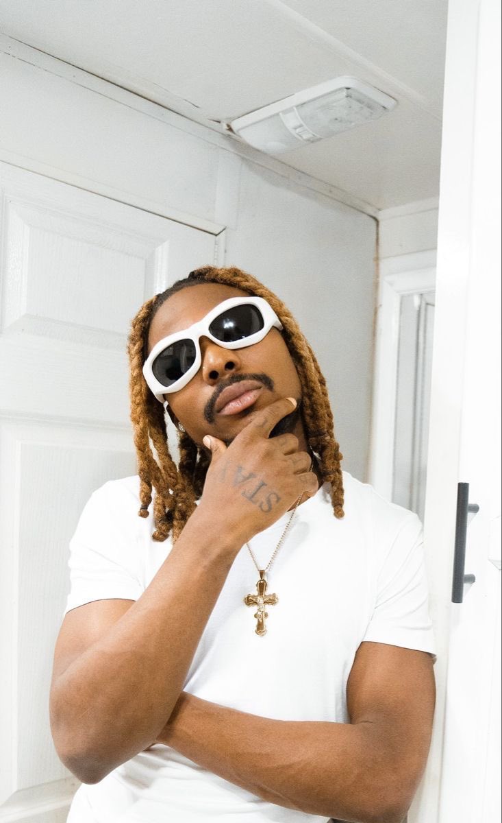 Asake’s Fashion Evolution: Lagos Streets and His Red Bull Symphonic Look