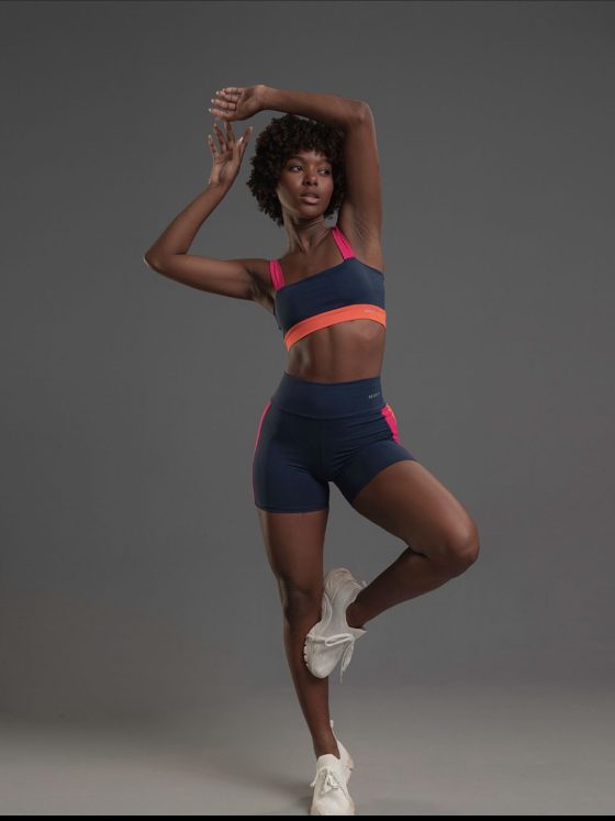 An African woman in eco-friendly organic cotton sportswear.