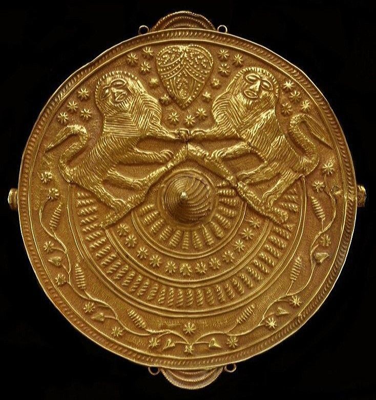 A brass Ashanti gold weight, illustrating African cultural metalwork and trade history.