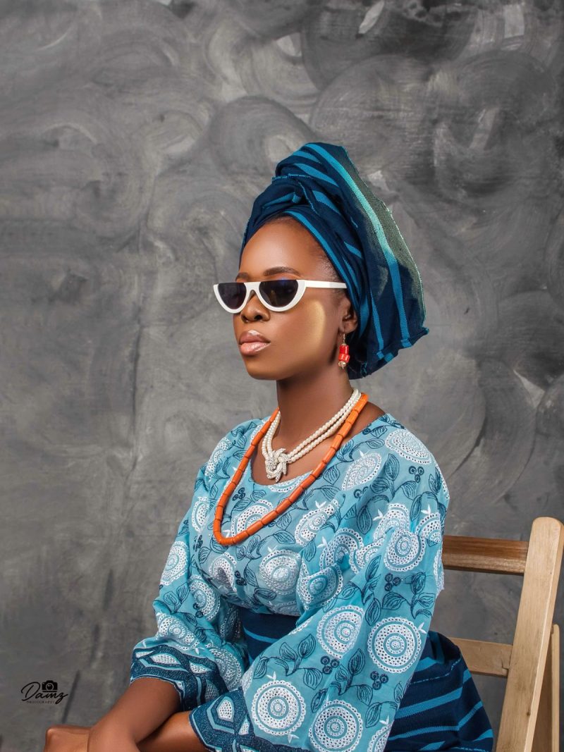 An African woman in sunglasses.