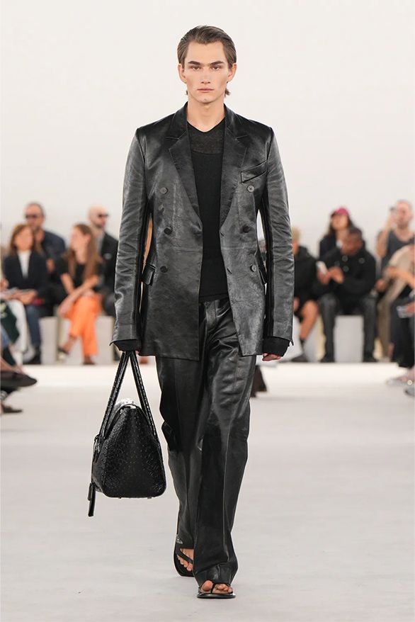 A high-fashion look from a Ferragamo collection led by Maximilian Davis, showing a modern take on classic Italian luxury tailoring.