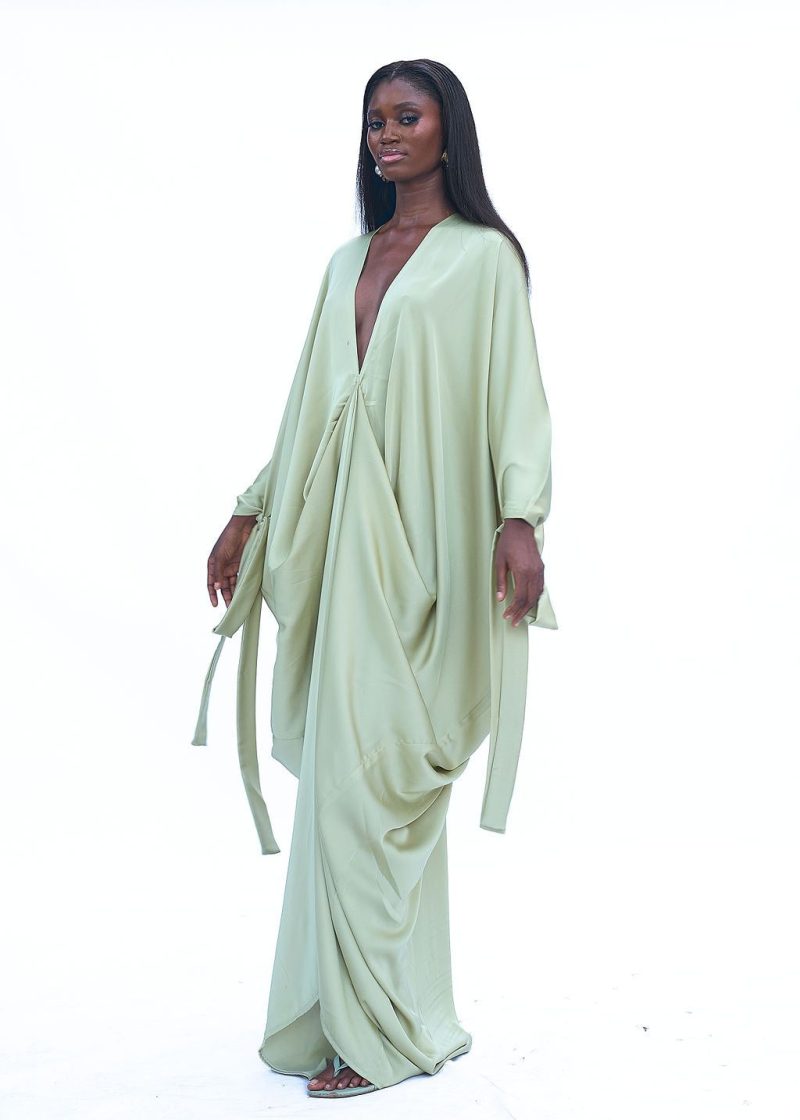 A 2026 high-fashion take on nomadic Saharan draping and linen layering.