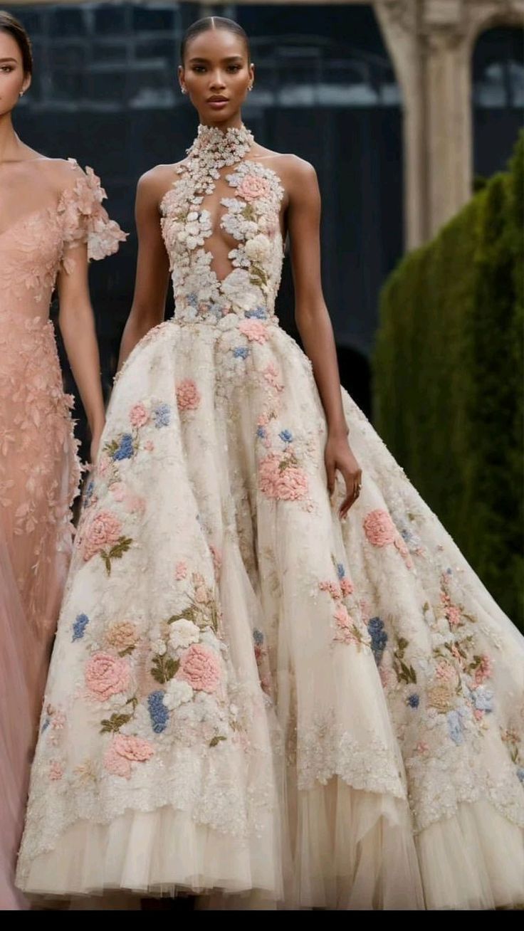 A high-end gown representing the 2026 trend for 3D botanical textures and floral appliqués.
