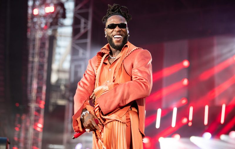 Burna Boy's stadium-selling performances and luxury brand partnerships exemplify the global Afrobeat expansion's cultural and economic power