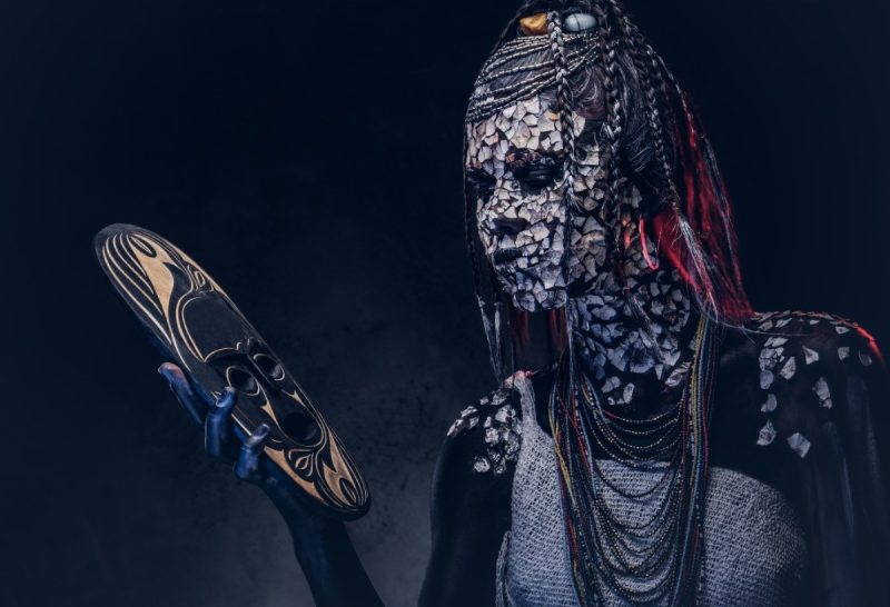 Contemporary African spiritual practitioner with ceremonial body paint