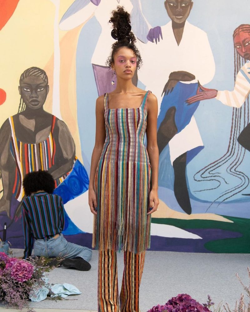 Showcasing contemporary tailoring using traditional Nigerian Aso-Oke fabric, illustrating reclaiming the narrative in luxury fashion, designed by Kenneth Ize.