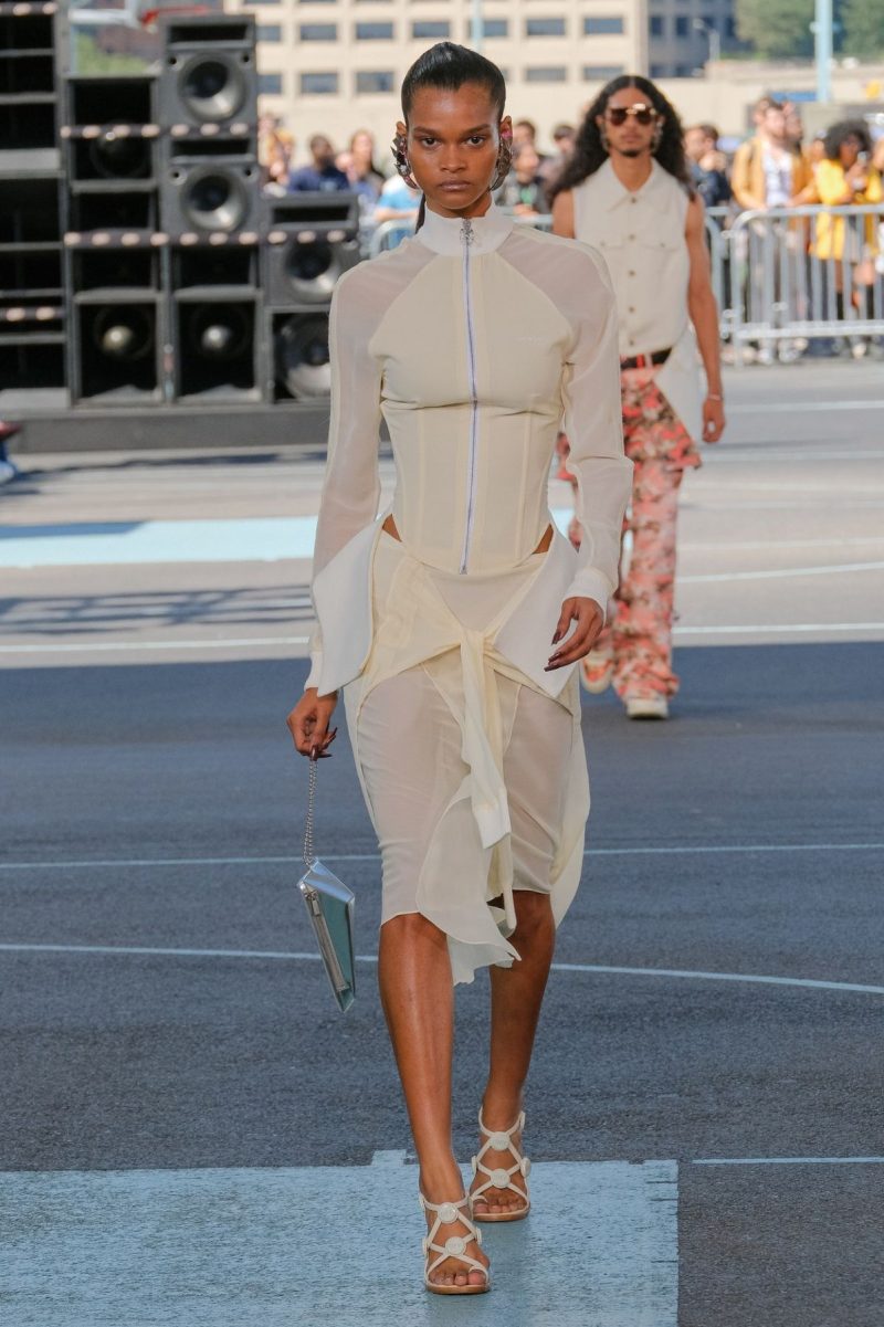 A high-fashion look from a Ferragamo collection led by Maximilian Davis, showing a modern take on classic Italian luxury tailoring.