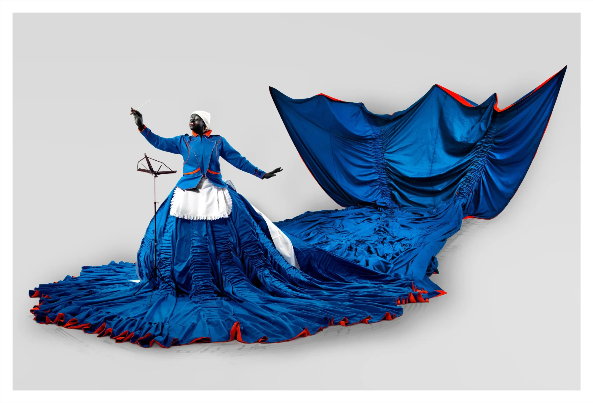 Sculptor portraying powerful, liberated Black women through life-sized figures.