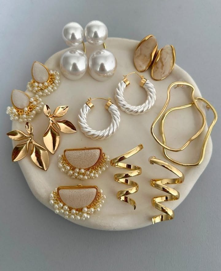 A picture showing essential earrings needed in your capsule.