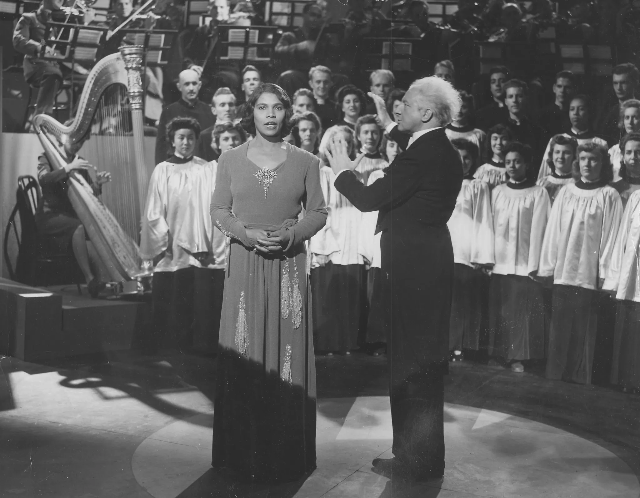 Singer Marian Anderson and conductor Leopold Stokowski perform with the Westminster Choir
