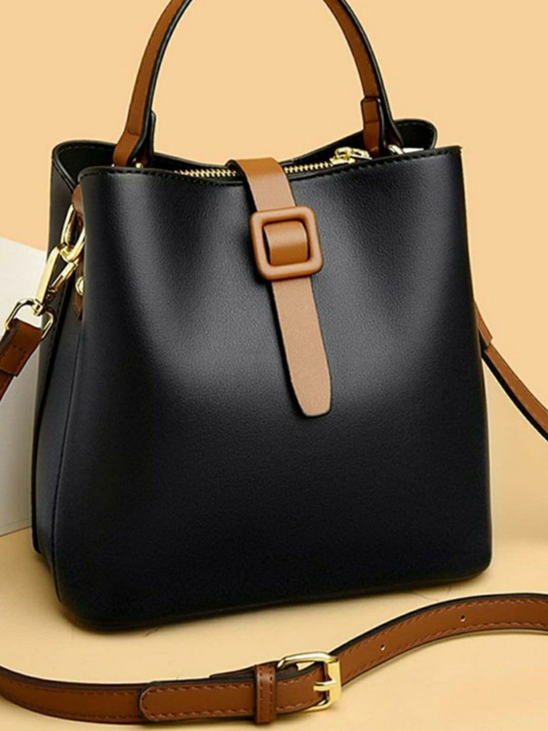  A picture showing a neutral-coloured handbag that can be styled with multiple outfits to demonstrate versatility and long-term use.
