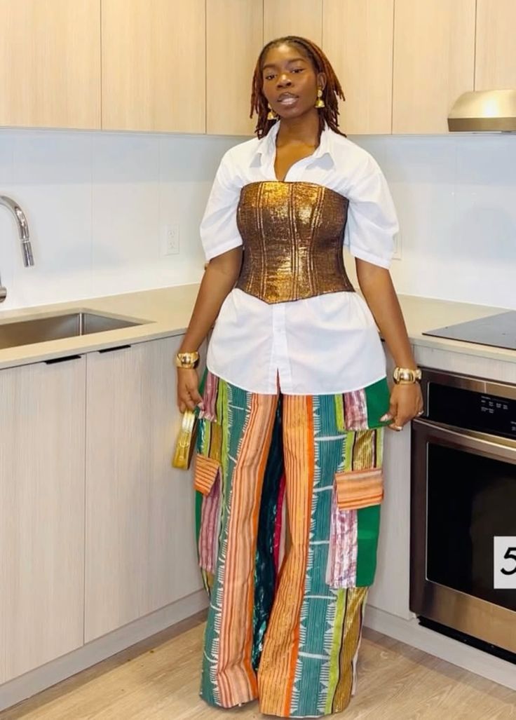 The Golden Rule of Scale: Macro vs. Micro


A sustainable and inclusive guide to mixing large and small patterns.
Image source: https://i.pinimg.com/1200x/65/47/ae/6547ae3ed15414ada5f0e06911eb60de.jpg 
The first thing you need to master when mixing prints is understanding scale. In 2026, the best way to combine different patterns is to make sure they don’t compete for attention. Imagine a conversation where everyone talks at once; no one stands out. By adjusting the size of your prints, you can create a look that suits any body shape and still looks polished and professional.
I always begin with a large-scale print as the main piece. For example, I might choose a bold, long Ankara duster coat with significant floral patterns. To balance the look, I add a small-scale print, like pinstriped silk trousers or a tiny geometric-print blouse from Lisa Folawiyo. This creates a clear visual order that looks thoughtful and polished. This method is also sustainable because you’re not just buying matching sets; you’re finding new ways to wear what you already have, so your style feels new and elegant.
When you master the scale, you master the room. It’s a quiet way of showing culture. When you get the scale right, you stand out in any room. It’s a subtle way to show respect for the boldness of African textiles while making sure you wear the outfit, not the other way around. This style is fresh and on-trend, and it shows confidence in who you are in 2026.

Finding Your Colour Anchor
If scale is the science behind mixing prints, then colour is the soul. In 2026, the best print combinations aren’t random; they work because they share a standard palette. I've noticed that when your prints have similar colours, you can mix even the most different patterns.
Tongoro by Sarah Diouf is a brand that really gets this right. They’re known for bold, graphic prints and often stick to a simple palette, like their famous black-and-white patterns. I’ve found you can mix a Tongoro zig-zag print with a polka dot from another sustainable brand if they both have that clean white base. This gives you a polished, put-together look that feels planned rather than random.

This is a sustainable and inclusive guide to unifying mixed prints with Tongoro.
Image source: https://i.pinimg.com/1200x/a9/09/63/a9096339f6da6b152dc5d740fe473738.jpg

Finding one colour to tie everything together really boosts my confidence. This style tip works for everyone, whether your look is bohemian, business, or streetwear. The 'Common Thread' rule helps you look polished and confident.

ALSO READ:
African Power Dressing: Clean Lines, Bold Silhouettes
Lisa Folawiyo’s Vision of Contemporary African Luxury
5 Reasons Arabian Fashion Blends Naturally with African Clothing
Your Secret Style Weapon
Sometimes, the best way to stand out in high fashion is to give the eyes a place to rest. In 2026, the "It Girl" understands that Afrocentric Soulful Minimalism is not just about adding more but also about knowing when to keep things simple. Neutral Anchors help with this. If you layer a solid, professional piece between two bold prints, you create a polished look that feels both expensive and intentional.

Using sustainable neutrals to anchor inclusive African prints.
Image sources: https://i.pinimg.com/1200x/f5/63/3a/f5633a6c7051d037949c9ca9ce92b5c2.jpg 

I’ve noticed how Orange Culture uses this approach. They often pair their bright, hand-dyed Adire prints with simple, structured neutrals, such as a crisp, oversized white shirt or a sand-coloured blazer. This type of outfit is an excellent example of sustainability. When you invest in quality neutral basics, you can wear your boldest prints more often without feeling over-the-top. This inclusive approach to styling lets anyone, regardless of comfort level, try bold African textiles while still looking polished for work or a fancy dinner.
I’ve learnt that a neutral anchor works like a painting frame. It shows off the print’s details without letting the patterns blend. This is the top "It Girl" trick for looking confident in 2026: let your prints stand out while using neutrals to keep your style sharp.

Conclusion
As we finish exploring the art of mixing prints, keep in mind that this is more than a fashion choice. It’s a celebration of Cultural Luxury Refined. In 2026, the "It Girl" doesn’t hide behind safe neutrals. Instead, she uses them as anchors to highlight her heritage. When you balance the scale, find a standard colour, and use neutral pieces well, you're not just putting on clothes. You’re showing your expertise and acknowledging cultural legitimacy.
What makes this movement special is its Inclusivity. Whether you wear Orange Culture’s bold designs or the graphic, sustainable looks from Tongoro, you are joining a global conversation about African excellence. Real style isn’t about chasing every trend. It’s about making sustainable choices, picking pieces with a story, and styling them in ways that always feel new.
I’ve found that the most essential part of mixing prints is confidence. Once you know the rules, you can break them with style. So go ahead, mix with purpose, wear your history proudly, and let your wardrobe show the refined, multifaceted woman you are.

Your style is your loudest voice. To discover more ways to master the bold and the beautiful in African luxury, step into the world of Omiren Styles.

Frequently Asked Questions (FAQs):
1. Can I mix two different types of African textiles, like Kente and Ankara? 
A: Absolutely! This is the peak of refined cultural luxury. To keep it professional, ensure they share a common thread (like a specific shade of gold or blue) or use a neutral blazer to ground the look.
2. Is there a "safe" print for beginners to start mixing with? 
A: Stripes are often considered the "neutral" of the print world. A simple black-and-white striped tee or button-down is the perfect entry point for pairing with a bold, sustainable Tongoro print.
3. Does print-mixing work for professional or corporate settings? 
A: Yes, if you use the neutral break rule. Pairing a printed silk blouse with a solid-coloured suit and adding a subtle printed pocket square or scarf shows high-level expertise without being distracting.
4. How do I choose accessories when wearing mixed prints? 
A: Keep your accessories minimal and solid. Let the patterns be the star. Choose one colour from your prints, such as "Terracotta," in your Adire fabric, and match your bag or shoes to that hue for a refined finish.
5. Is mixing prints sustainable? 
A: Very! It encourages "wardrobe recycling". Instead of buying a new matching set, you learn to mix older pieces in your closet to create a brand-new, trendy look, which is the heart of sustainable fashion in 2026.
