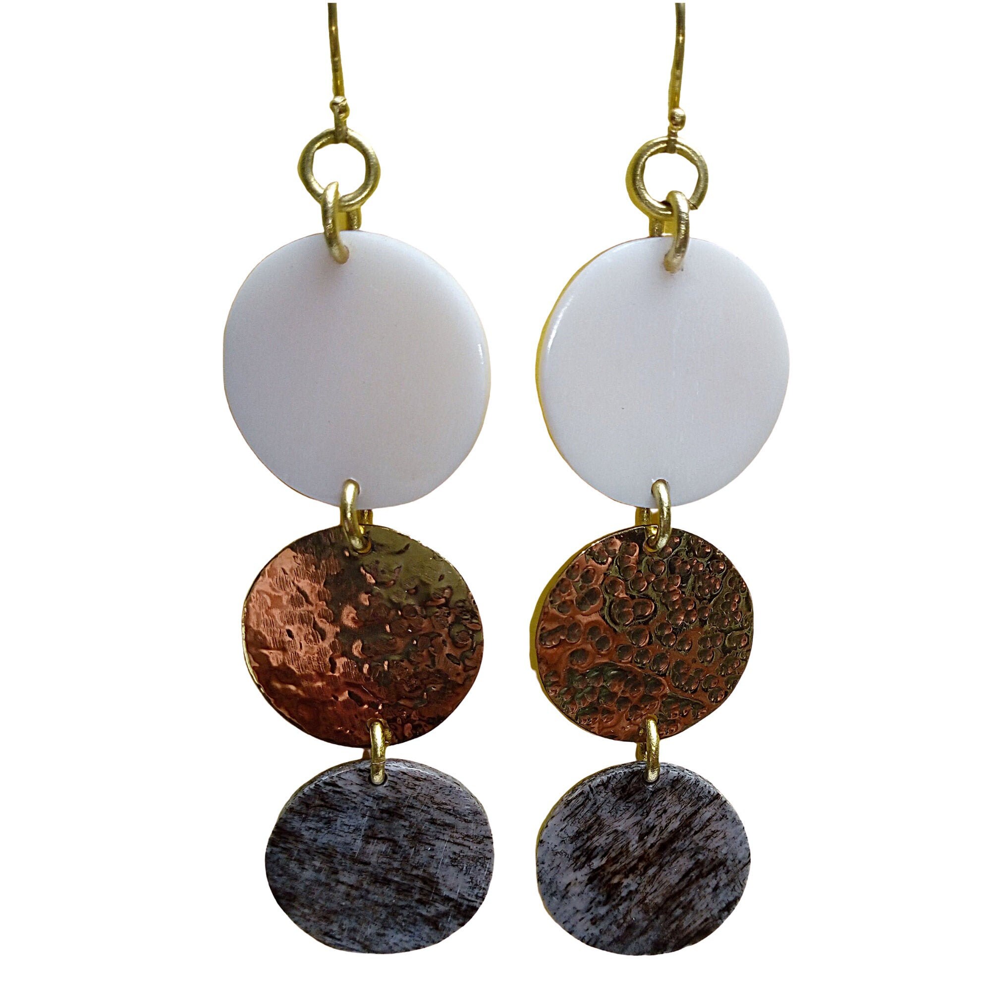 A picture of a cultural minimalist piece of jewellery, signifying identity.