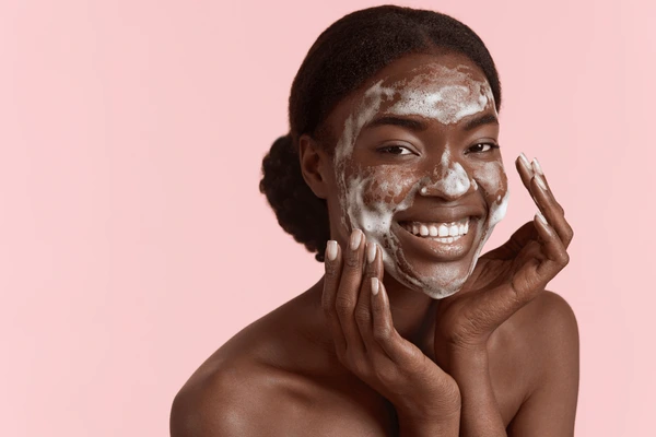 A photo of a woman applying skincare.
