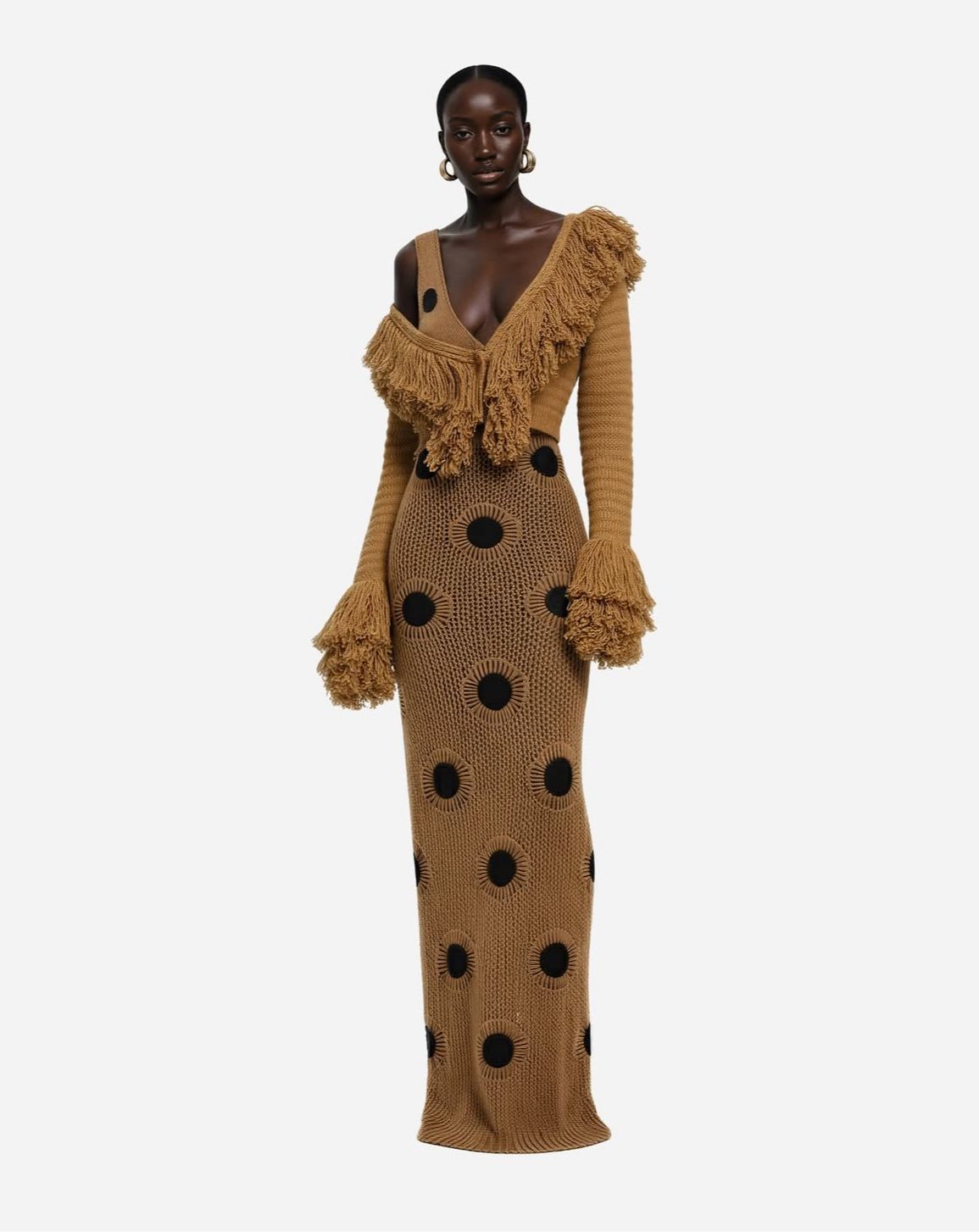 A trendy look of a woman in a Hanifa knit dress.