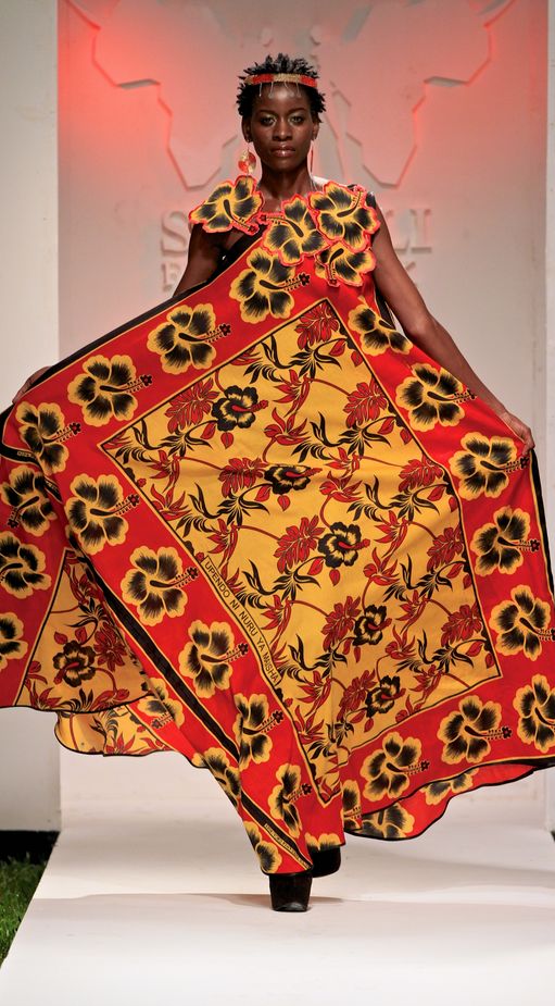 An inclusive woman in high-end Katush Khanga poetry, representing the 2026 fusion of Swahili heritage and modern luxury.