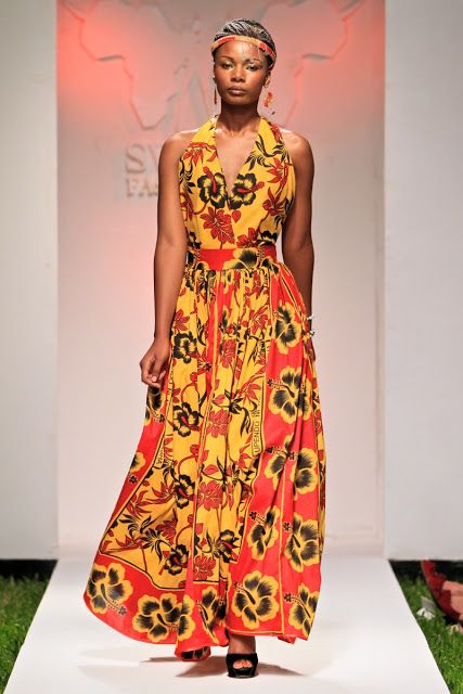 An inclusive woman in high-end Khanga poetry by KikoRomeo, representing the beauty of the jina as a silent statement of authority.