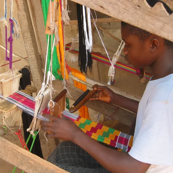 How Kente Weaves History Into Every Thread