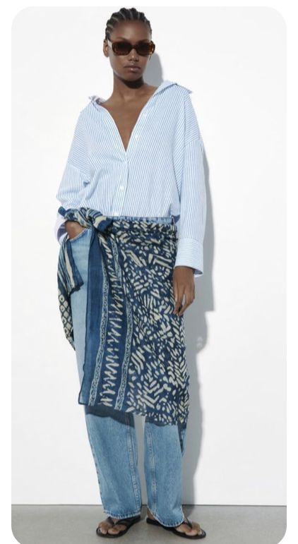 An inclusive woman representing the visionary fusion of luxury and heritage using Adire silk.
