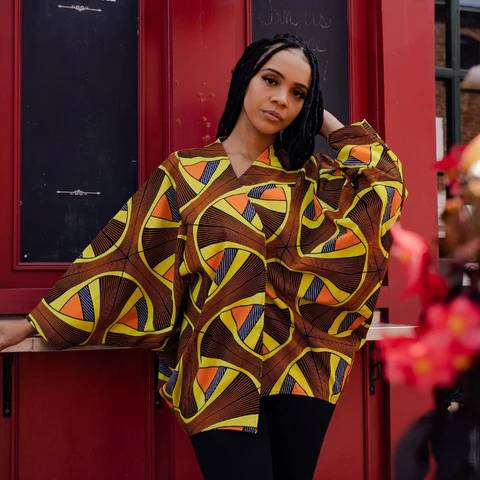 A picture showing how African dress is now part of cold-weather culture.