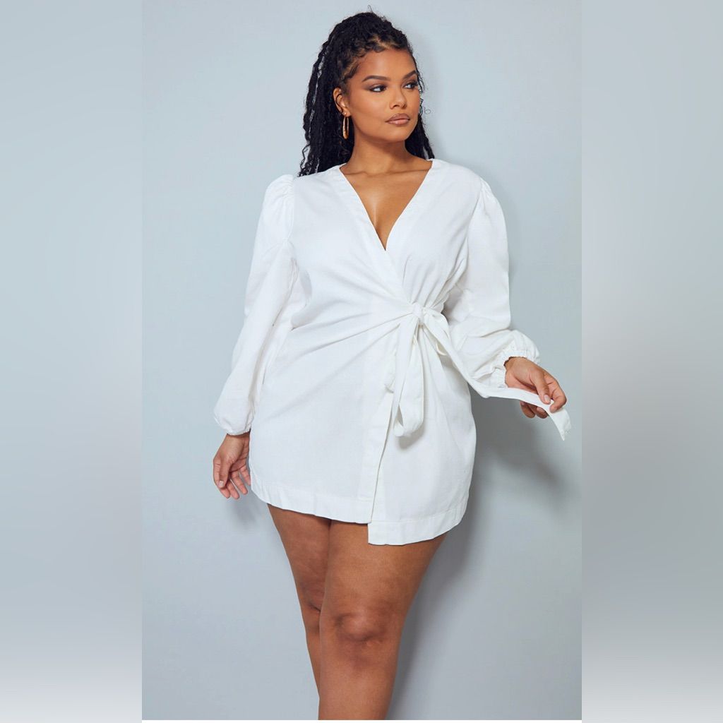 An inclusive woman in high-end Katush, representing the visionary fusion of Swahili coast weaving and modern luxury.