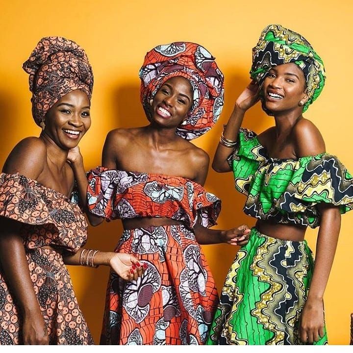 A picture of 3 women wearing traditional clothing, showing cultural appreciation.
