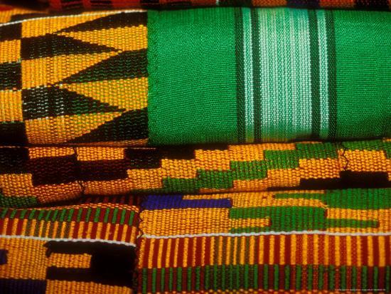 A picture showing a variety of Kente folded.