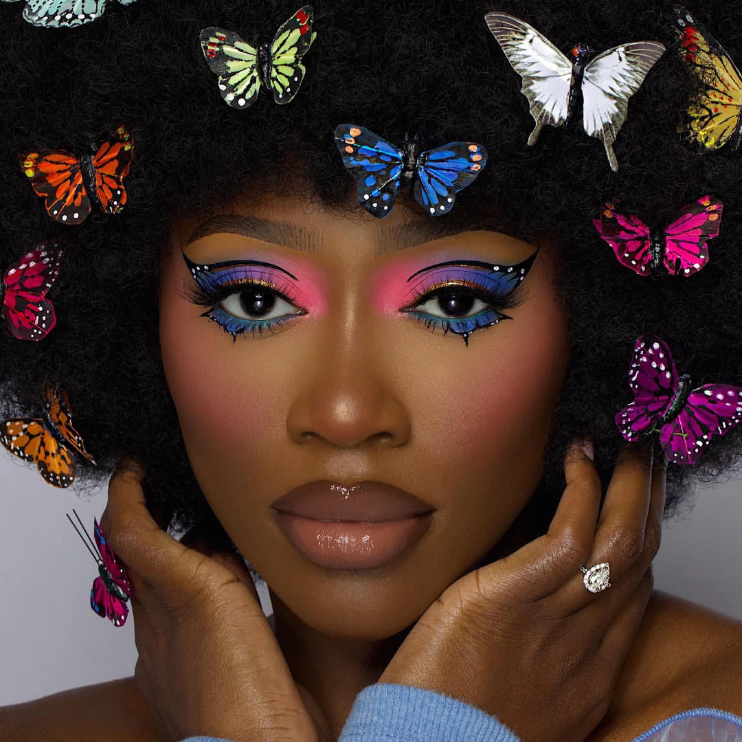 An image of a lady on editorial makeup
