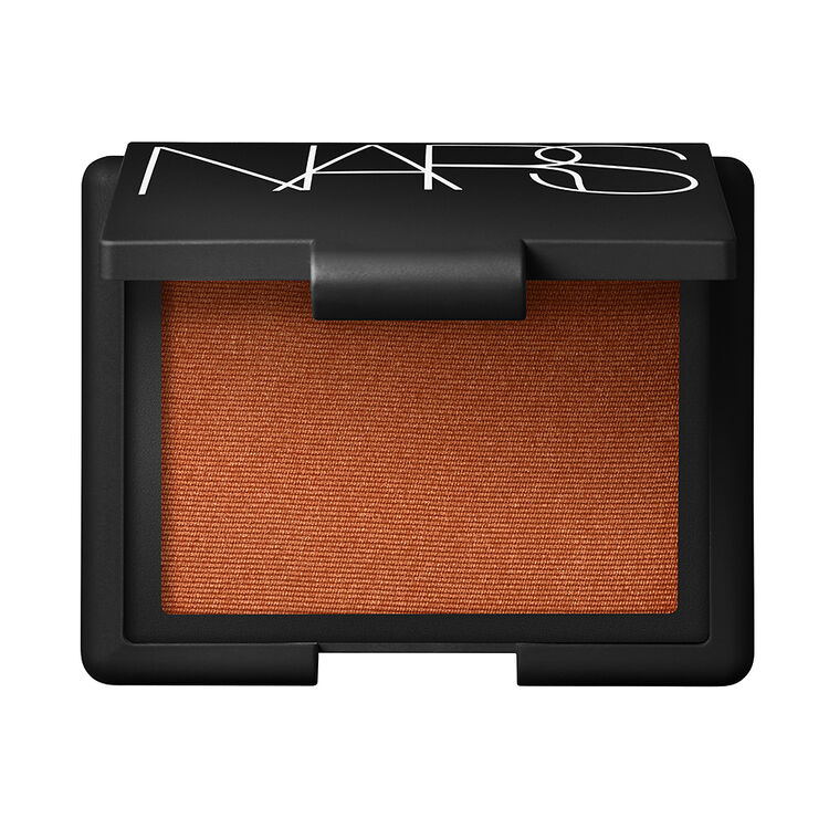 An image showing a highly pigmented powder blush that shows on deep skin

