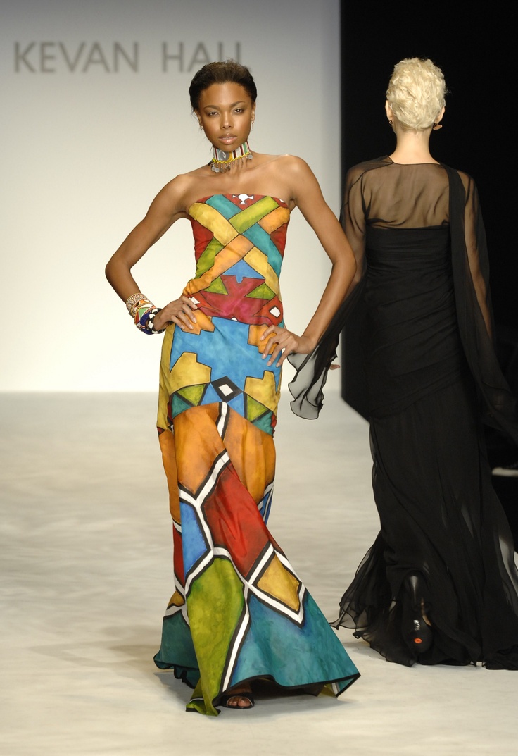 An image showing a model dressed in a patterned dress, which is influenced by the Ndebele aesthetic
