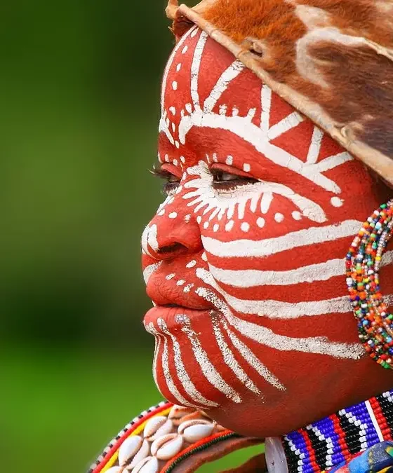 The Cultural History and Impact of African Body Paint Traditions in Runway Fashion