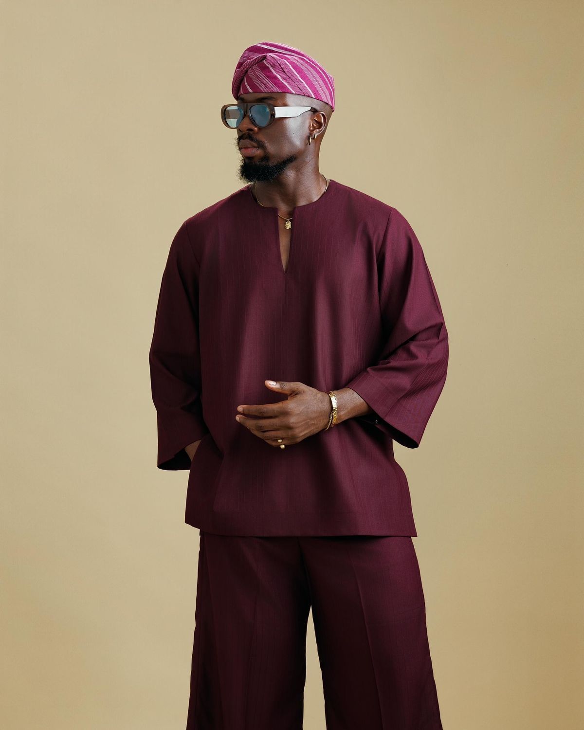 An inclusive man in sustainable African wear, representing the visionary fusion of artisanal heritage and modern luxury.