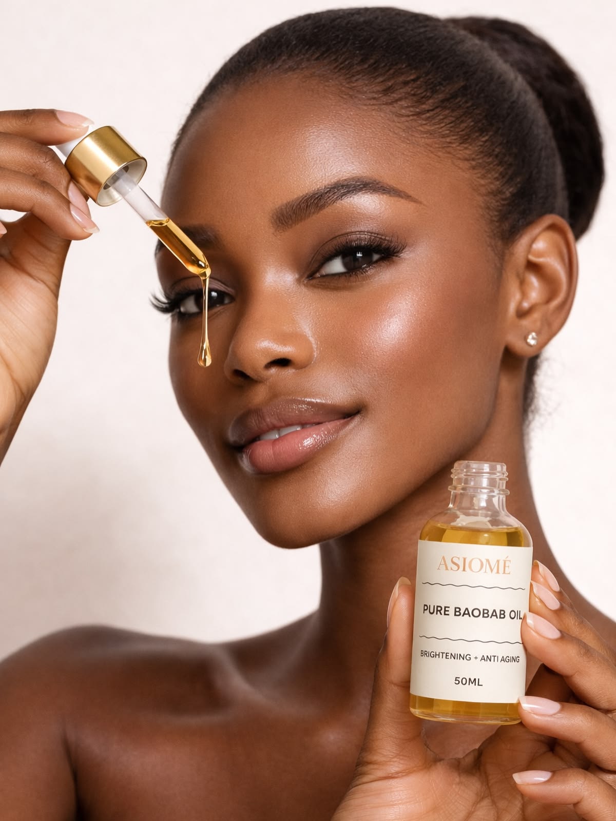 Baobab oil applied to skin, showing hydration and benefits for African botanical skincare.
