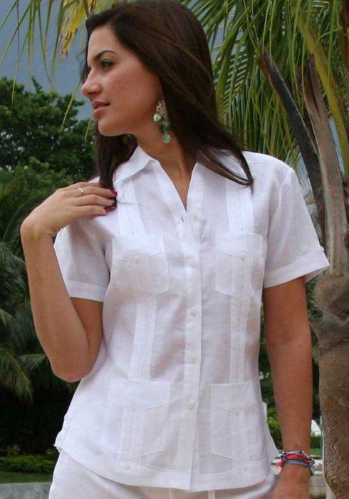An inclusive woman in high-end Clandestina linen, representing the visionary fusion of Cuban street dress and modern luxury.