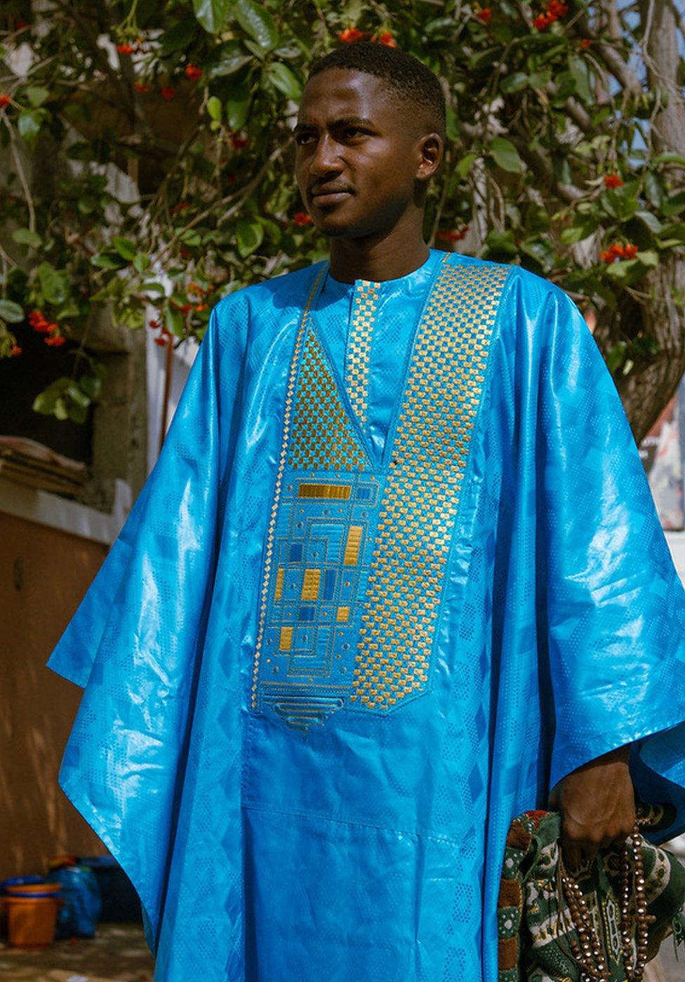 An image showing a man wearing a Senegalese boubou for Eid