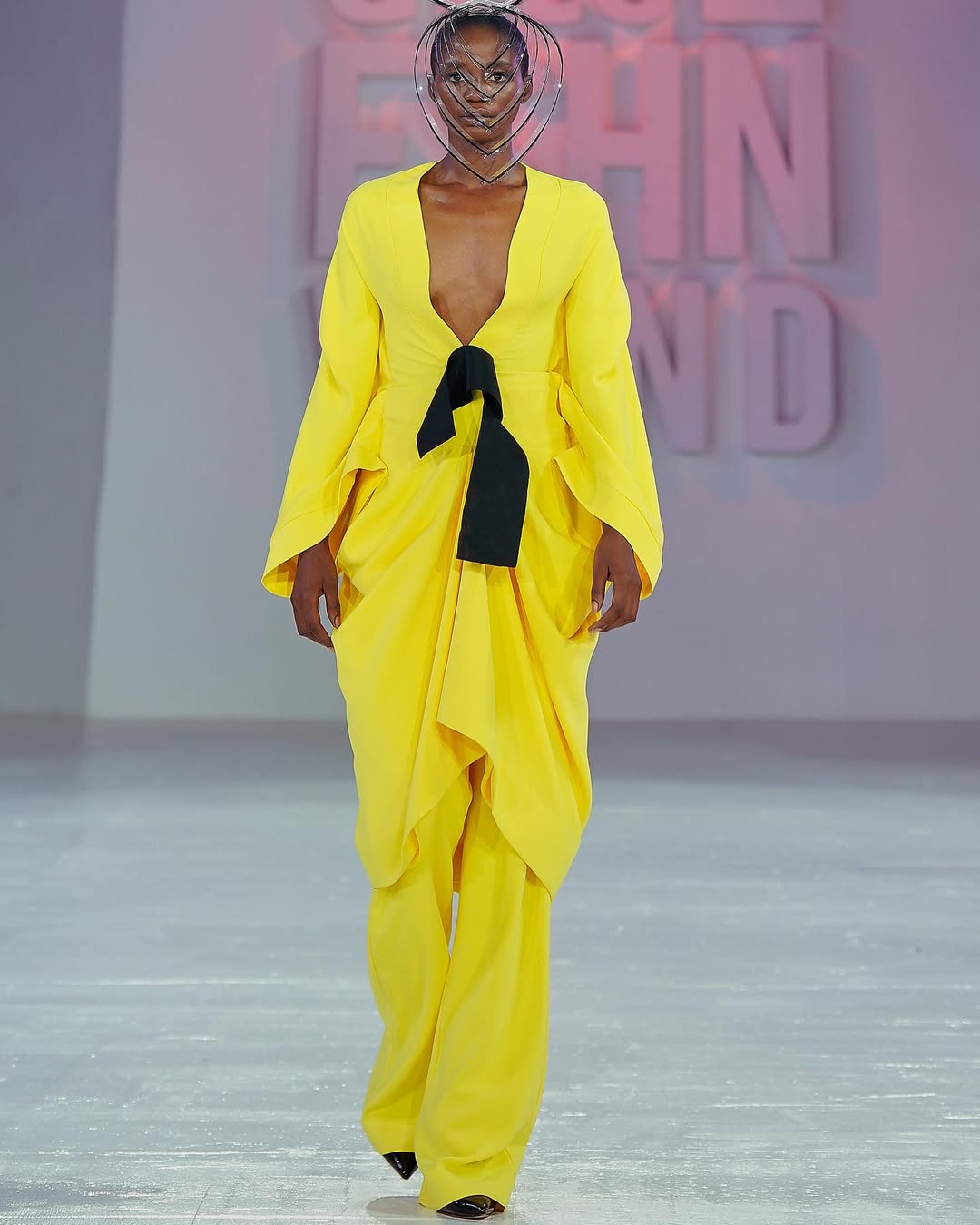 An image showing a model dressed in a piece by one of Senegal's fashion designers, Omar Salam