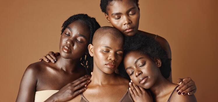 An image showing different ladies showing different colour theory for melanin-rich skin