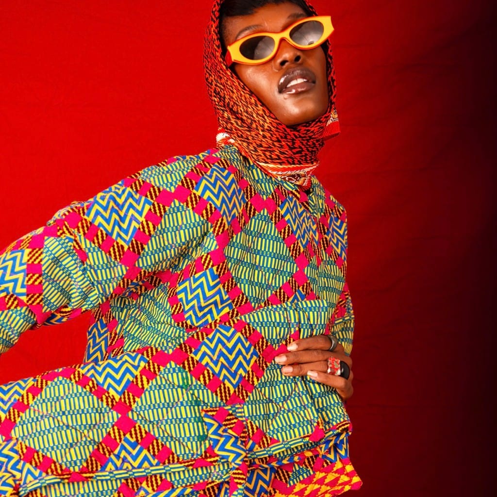 An image showing a lady wearing African wax prints, one of the fabrics that make up modern Ghanaian fashion