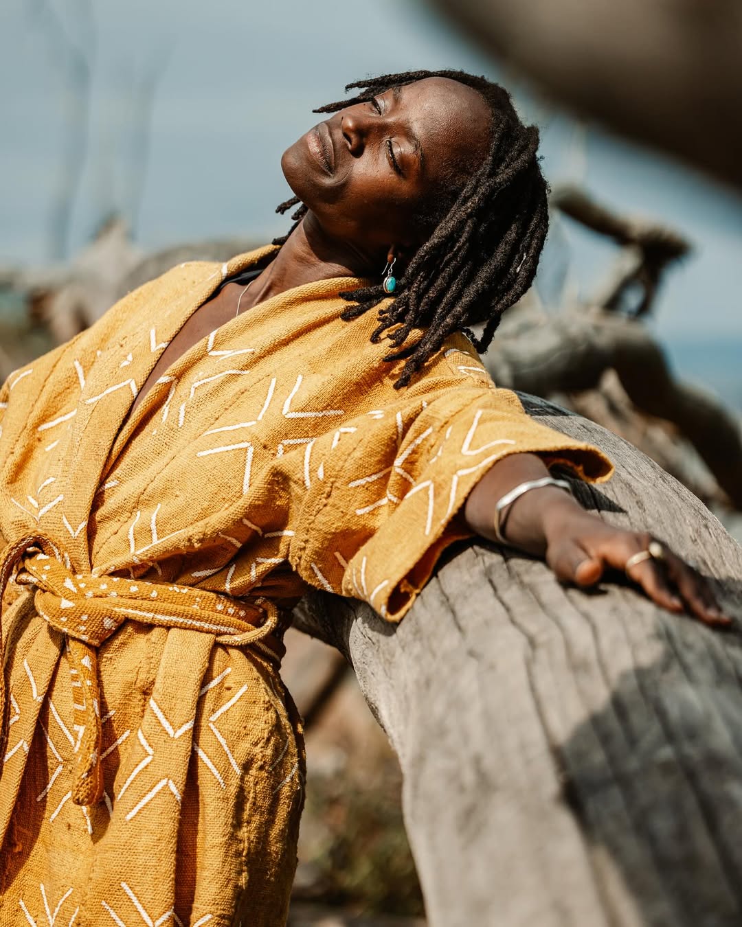 : An image showing a model wearing a kimono made from Malian textile