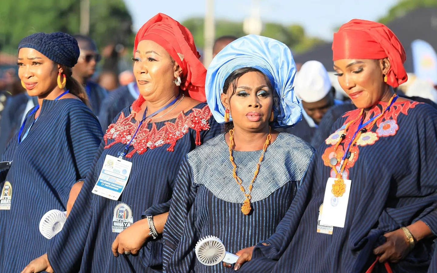 An image showing a group of ladies wearing traditional Guinean fabric during an occasion