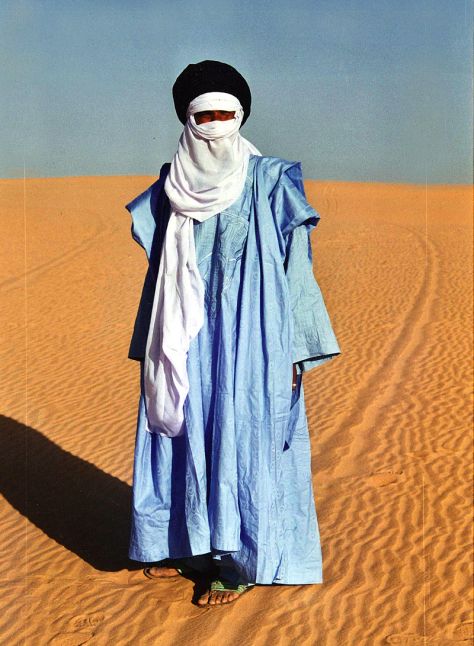 Tuareg men wearing indigo clothing in the Sahara Desert. 
